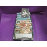 A box of several hundred mixed age postcards