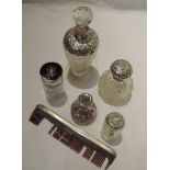 A selection of cut and pressed glass dressing table bottles having HM silver and white metal lids/