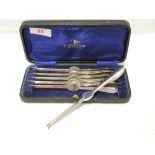 A cased set of six silver lobster picks of plain form, Sheffield 1956, Walker & Hall