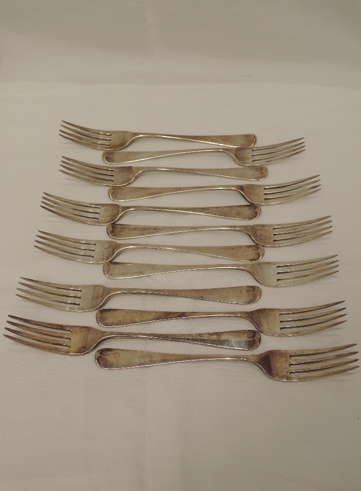 Twelve Victorian & Georgian silver table forks of plain form, London 1826/30/35/39/43, William