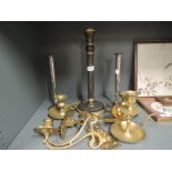 A selection of vintage brass cast and similar candle sticks