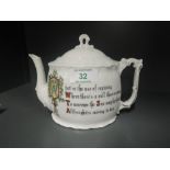 A vintage tea pot with motto transfer print relating mill and working