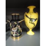 A miniature milk churn hand decorated with bird design, and similar decorated glass vase