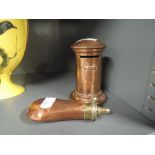 A selection of vintage copper items including model letter box and gun powder or shot flask