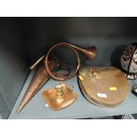 A selection of copper wares including horn, candle stand, back warmer etc