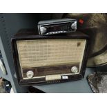 A vintage Philips radio and a JVC car radio