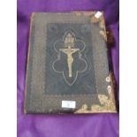 A vintage Family bible with brass decoration and clasps