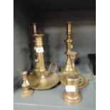 A selection of vintage brass wares including candle sticks