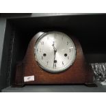 A vintage oak bodied mantle clock by Smiths with chime