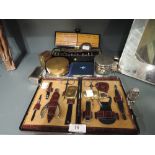 A selection of vintage trinkets and curios including unusual vestas