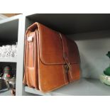 A vintage style leather satchel bag