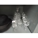 A selection of vintage twist stem spirit glasses and similar decanter set