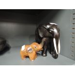 Two vintage wood elephant figures