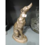 A vintage figure of a grey hound dog by Firth products