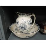 A vintage wash jug and bowl set with transfer print