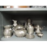 A selection of vintage pewter wares including tankard teapot etc