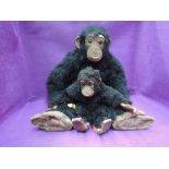 Two Dean's Childs Play Toys black plush Chimpanzee with baby, both having vinyl face, ears, hands