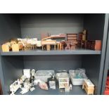 Two shelves of modern wooden, plastic and ceramic dolls & dolls house furniture and accessories