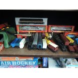 A shelf of Hornby and similar 00 gauge including three Intercity locomotives, two boxed R240 & R268,