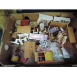 A box of mid/late 20th century wooden and plastic dolls house furniture and accessories, along