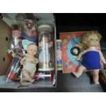 A selection of mixed vintage souvenir dolls, A BND celluloid doll, A Chad Valley Quoits board etc