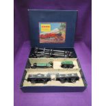 A Hornby tin plate and clockwork 0 gauge Goods train set comprising loco and tender 3435, two open