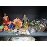 A shelf of Palitoy and similar Action Man dolls and accessories, mainly army related