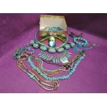 A box of costume turquoise jewellery including necklaces etc