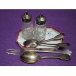 A selection of HM silver including three Georgian teaspoons, a pair of cut glass pepperettes