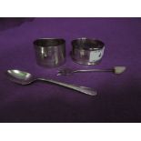 Five pieces of HM silver including three napkin rings