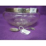 A cut glass trifle bowl having silver rim, Birmingham 1912, makers mark worn, and an HM silver