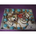 A selection of costume jewellery including enamelled ladybird bracelet. Nomination style bracelet,