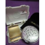 A vintage Kleeneze box containing two Stratton compacts