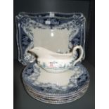 A selection of vintage blue and white ware ceramics including square chargers