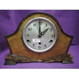A vintage art deco design mantle clock with chime