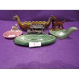 A selection of vintage Wade pipe holders and similar including Viking long boat