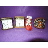 A selection of vintage flip and travel clocks