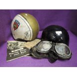 A selection of vintage motor cycle and bike equipment including BSA helmet and goggles