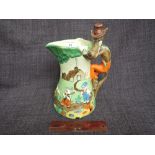 A 1930's pottery jug of humorous Three Little Pig design