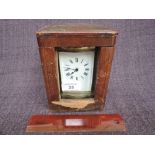 An early 20th century brass French carriage clock of traditional four glass design, on bun feet,