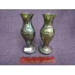 A pair of late 19th century green iridescent vases of Loetz style
