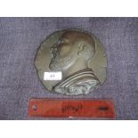 A 19th century bronze plaque depicting Hippocrates in the antique style