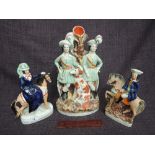 A pair of 19th century Staffordshire flatback figures modelled as horses and riders, and a 19th