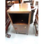 An early 20th Century oak bedside cabinet