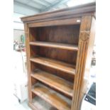 A modern hardwood bookshelf in the rustic style