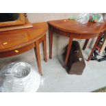 A pair of reproduction half moon tables