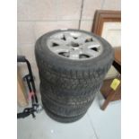 A set of 4 16' alloy wheels with 205/55/R16 winter tyres