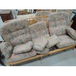 An Ercol style three piece cottage suite