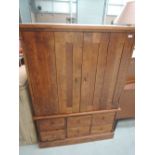 A Laura Ashley entertainment cabinet with drawer base