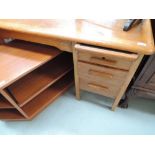 An early 20th Century golden oak desk